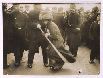 Photo of a Suffragette being arrested on Black Friday