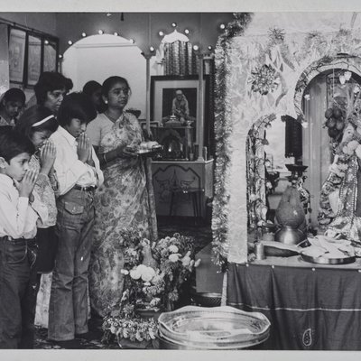 Photograph of people praying at Hindu Temple