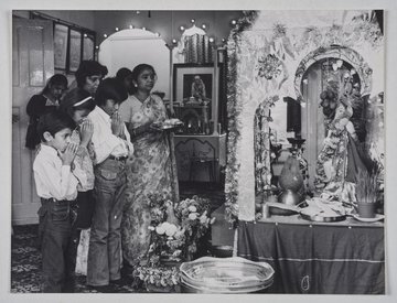 Photograph of people praying at Hindu Temple