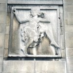 Photo of a wall sculpture by Eric Gill