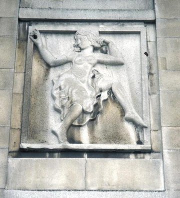 Photo of a wall sculpture by Eric Gill